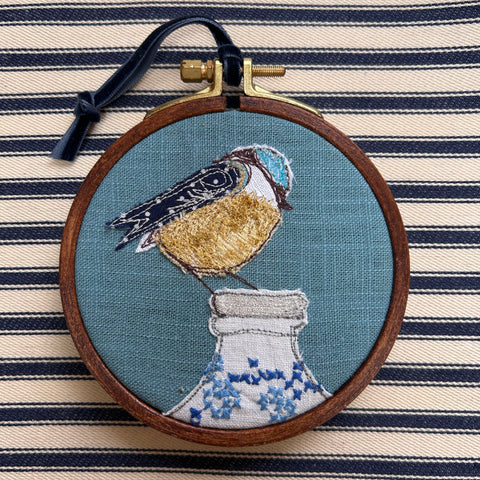 “Breakfast” Blue bird on milk bottle embroidered picture.