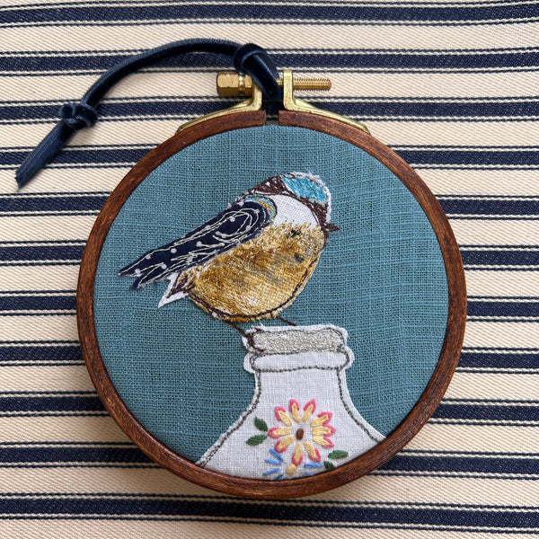 “Breakfast” Blue bird on milk bottle embroidered picture.