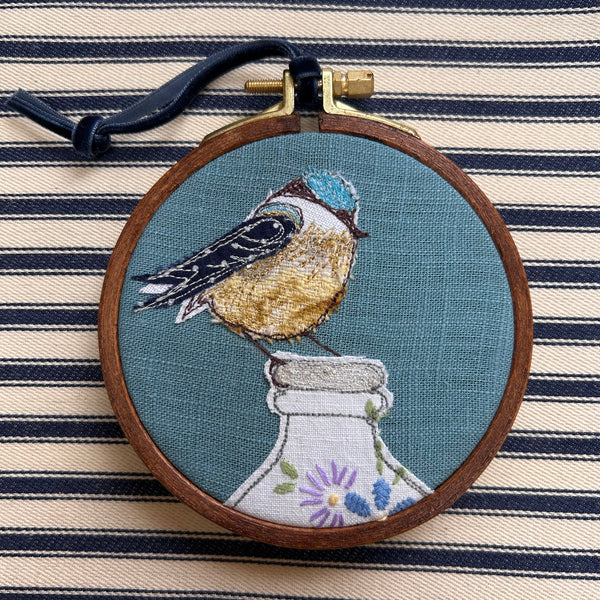 “Breakfast” Blue bird on a milk bottle embroidered picture.