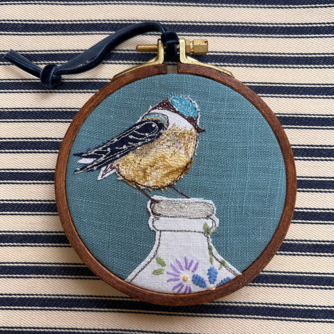 “Breakfast” Blue bird on a milk bottle embroidered picture.